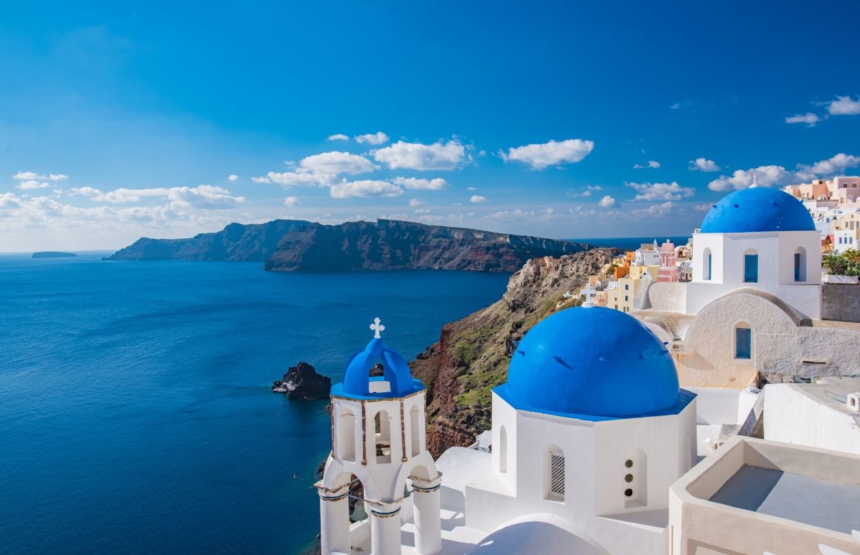 image of an aerial view of santorinis beaches and village